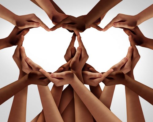 Hands forming a heart shape together.